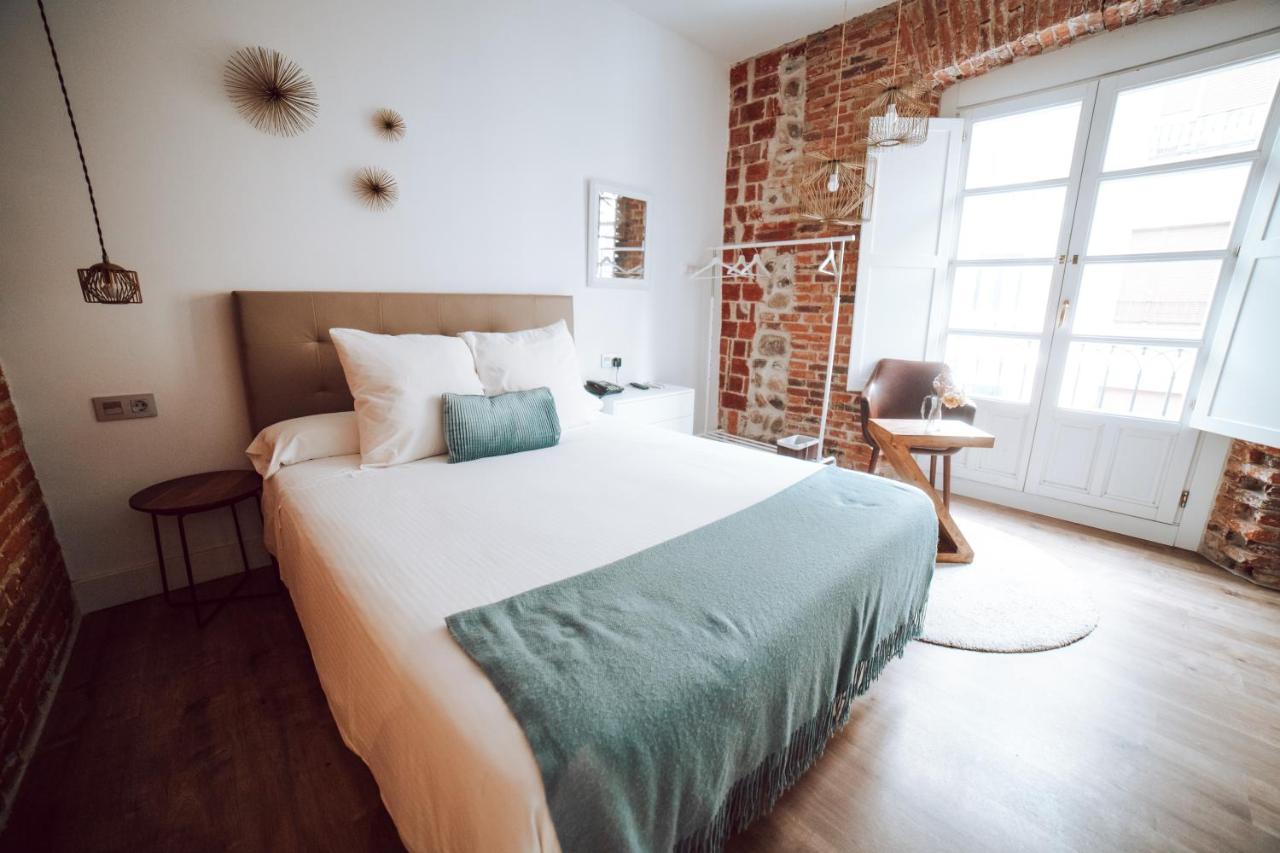 Albany Ancha Hotel Leon Bagian luar foto A bedroom at the hotel