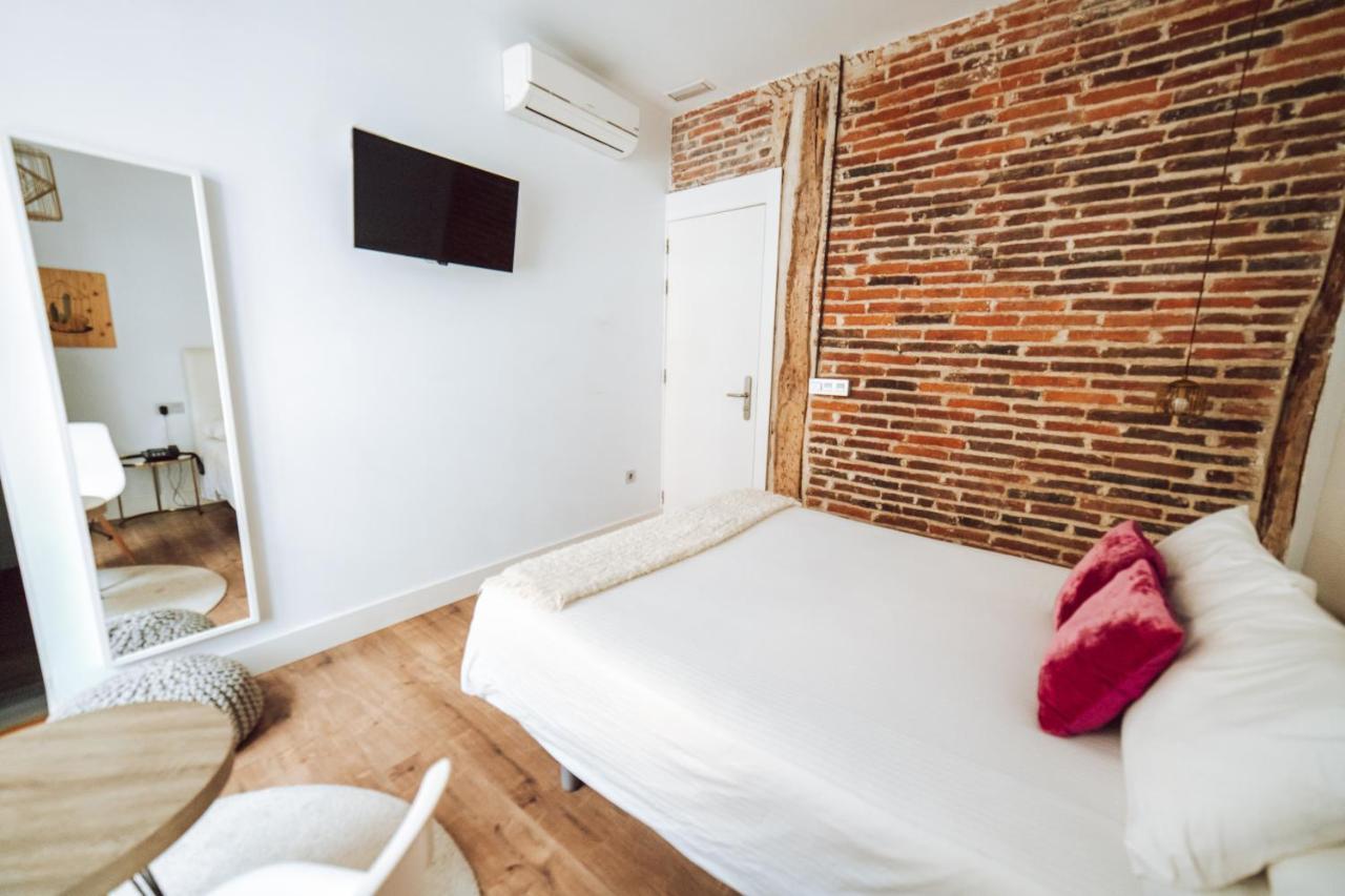 Albany Ancha Hotel Leon Bagian luar foto A room at the hotel