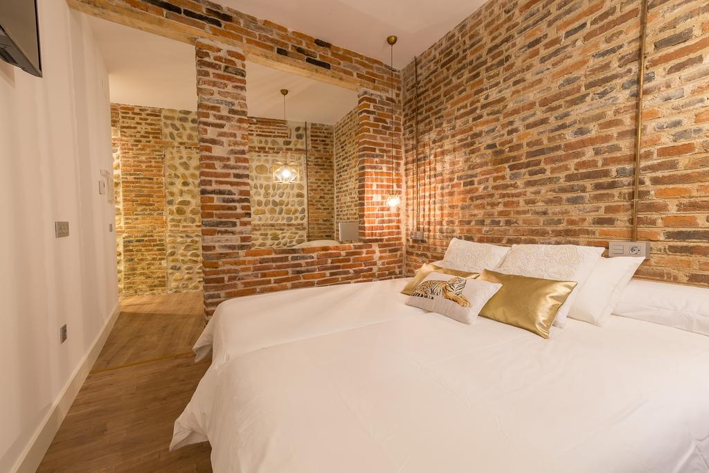 Albany Ancha Hotel Leon Bagian luar foto A bedroom at the hotel